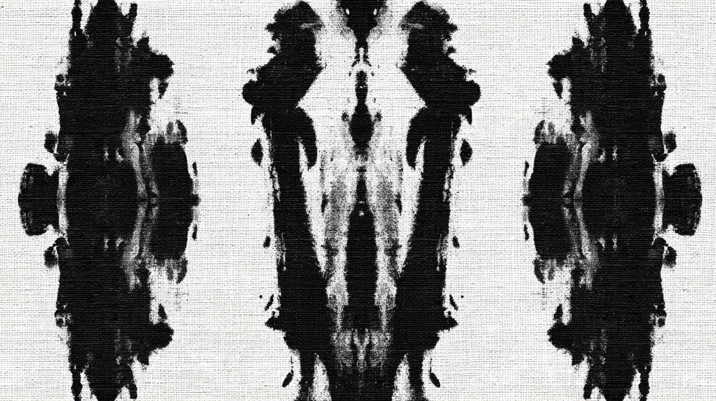 Person reflecting quietly at a desk